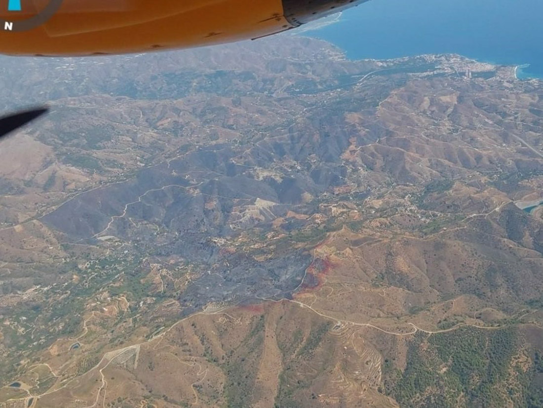 Vista aérea de la zona afectada por el incendio de Almuñécar, el pasado miércoles (PERFIL DEL INFOCA EN LA RED SOCIAL X) Vista aérea de la zona afectada por el incendio de Almuñécar, el pasado miércoles (PERFIL DEL INFOCA EN LA RED SOCIAL X)