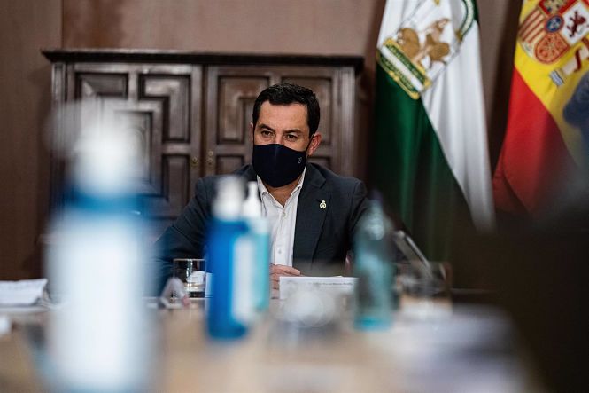 El presidente de la Junta de Andalucía, Juanma Moreno, en una reunión del Comité Director de Alertas (JUNTA DE ANDALUCÍA - ARCHIVO) 