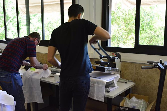  Imagen de archivo de un taller de serigrafía realizado por Cáritas Diocesana de Granada (CÁRITAS)