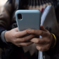 Una persona usa el teléfono móvil, en imagen de archivo (DAVID ZORRAKINO - EUROPA PRESS)